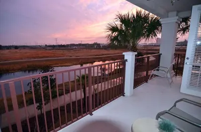 a balcony with a view of a body of water at Shoreway Condo #231524 in Orlando