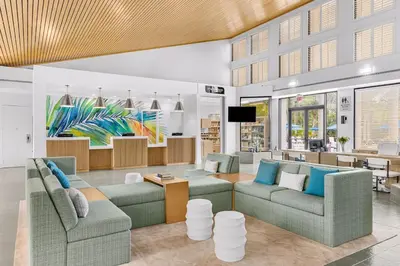 a living room with two couches and a tv at Marriott's Imperial Palms Villas in Orlando