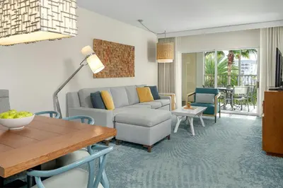 a living room with a couch and a table at Marriott's Harbour Lake in Orlando