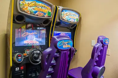 a purple video game machine with two games at Lake Buenavista Apartments close to Disney in Orlando