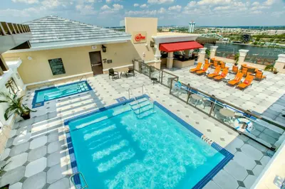 an overhead view of a swimming pool at a hotel at Plaza Suites On International Drive Near Universal Epic in Orlando