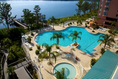 an overhead view of a swimming pool at a resort at Penthouse Blue Heron Condo in Orlando
