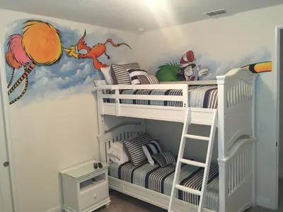 a bedroom with two bunk beds and a mural at DREAM HOUSE, ECOLAB Sanitzed NEAR DISNEY, POOL FENCE in Orlando