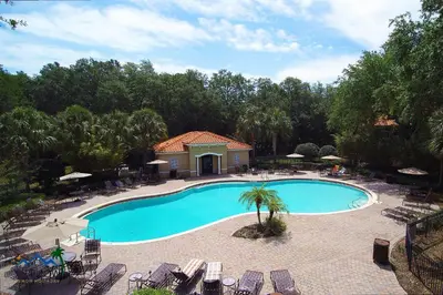 an overhead view of a swimming pool at a resort at Four Bedrooms TownHome 5122 in Kissimmee