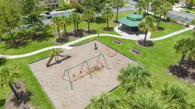 an aerial view of a park with a playground at Four Bedrooms TownHome 5161 in Kissimmee
