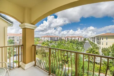 a balcony with a view of the resort at Orlando Resort Rentals at Universal Boulevard in Orlando