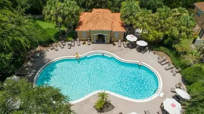 an overhead view of a swimming pool at a resort at Family Friendly Four Bedrooms 5147A in Kissimmee