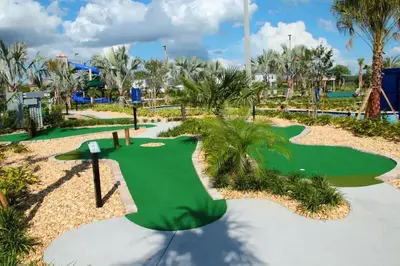 a miniature golf course at a resort at Four Bedrooms with Screen PoolStoreyLake 4910 in Kissimmee