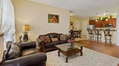 a living room with a couch and a table at Executive 3 Bedroom Villa at Universal,Convention Center, Vista Cay in Orlando