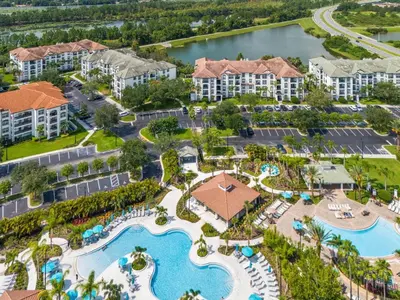 an aerial view of a resort with a pool and resort at Shoreway Loop Unit 108 Condo in Orlando