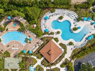 an overhead view of a pool at a resort at Cayview Avenue Unit 404 Condo in Orlando