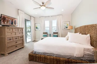 a bedroom with a bed and a ceiling fan at Delightful Home Near Disney With Private Pool, Media Room, Waterpark & Resort Access At Encore Resort Reunion - 7418Mr in Kissimmee