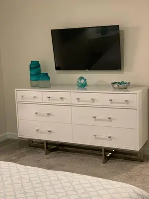 a white dresser with a television on top of it at DWS Vacation Villas in Orlando
