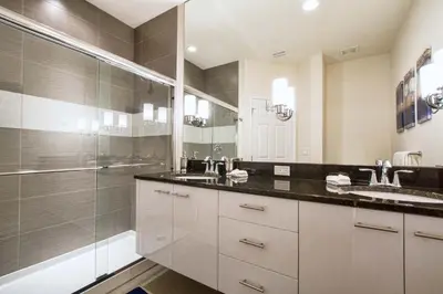 a bathroom with two sinks and a shower at Silver Creek - 3 Bed Townhouse Wsplashpool-5003Sc in Orlando