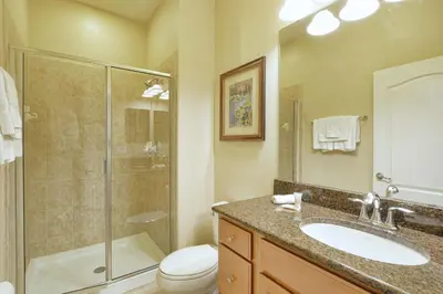 a bathroom with a sink and a shower and a toilet at Paradise Palms-4 Bed Townhome W-Splashpool-3035Pp in Kissimmee