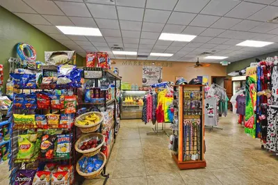 a grocery store aisle with a lot of products at Conservation View, Resort, Pool Home-3116Pp in Kissimmee