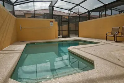 a swimming pool in the middle of a building at Dog Friendly Townhome W Splashpool-3202Pp in Kissimmee