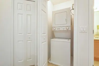 a white laundry room with a washer and dryer at Encantada -4 Bedroom Townhome W- Splashpool-2651En in Kissimmee