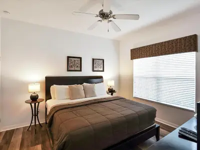 a bedroom with a bed with a ceiling fan and a window at Close To Clubhouse, Splashpool-3026Pp in Kissimmee