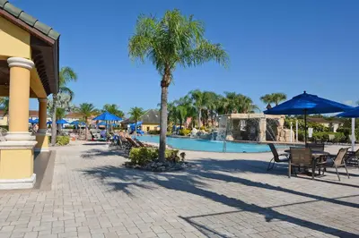 a resort with a palm tree and a swimming pool at Close To Clubhouse, Splashpool-3026Pp in Kissimmee