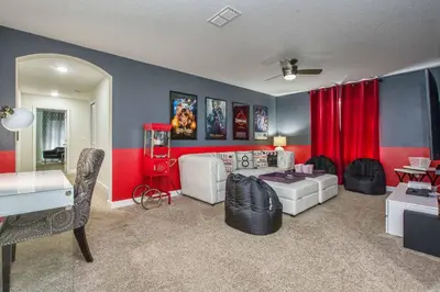 a living room with a red and blue wall at Across From Clubhouse, Private PoolSpa-1651Str in Kissimmee