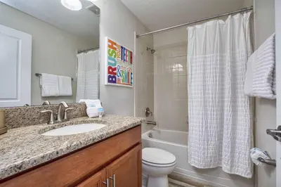 a bathroom with a sink and a toilet and a shower at Across From Clubhouse, Private PoolSpa-1651Str in Kissimmee