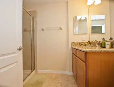 a bathroom with a sink and a shower at Beautiful Waterfront Townhome Wsplashpool-3024 in Kissimmee