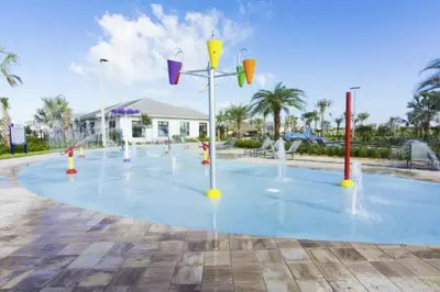 a playground with water fountains on a blue at Perfect Townhome for your Vacation with Private Pool SL4807 in Kissimmee