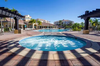 a small pool in the middle of a courtyard at Gorgeous Apartment in Orlando at Vista Cay Resort in Orlando