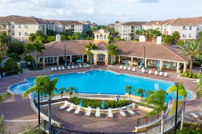 an aerial view of a pool at a resort at Gorgeous Apartment in Orlando at Vista Cay Resort in Orlando