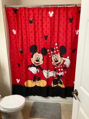 a bathroom with a mickey mouse shower curtain at Venetian Bay Villa 4 Bedroom Townhouse - Near Disney in Kissimmee