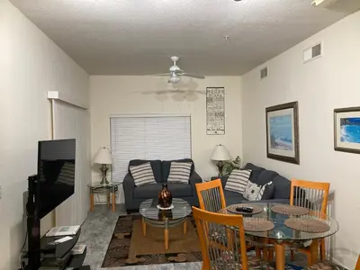 a living room with a couch and a table at Venetian Bay Villa 4 Bedroom Townhouse - Near Disney in Kissimmee