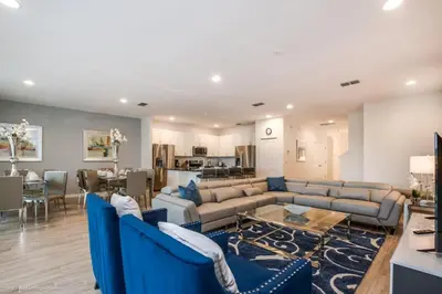 a living room with couches and a dining room at Calistoga Avenue Villa #259830 Villa in Kissimmee