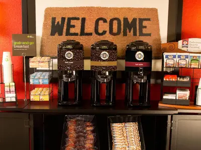 a store with a welcome sign on a counter at Extended Stay America Suites - Orlando - Altamonte Springs in Orlando