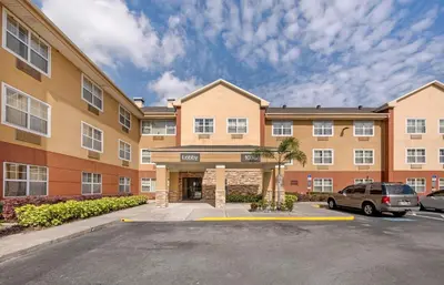a parking lot in front of a building at Extended Stay America Suites - Orlando - Lake Mary - 1036 Greenwood Blvd in Lake Mary