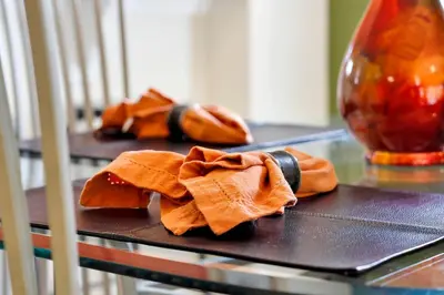 a pair of ties sitting on top of a table at Emerald Delight 3 bed townhome near Disney in Kissimmee