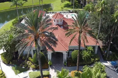 an aerial view of a house with palm trees at Emerald Delight 3 bed townhome near Disney in Kissimmee