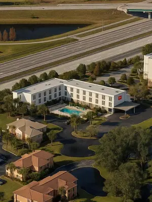 an aerial view of a building with a pool at Nobile Hotel Parkway at Celebration Orlando Very Close to Disney Theme Parks in Orlando