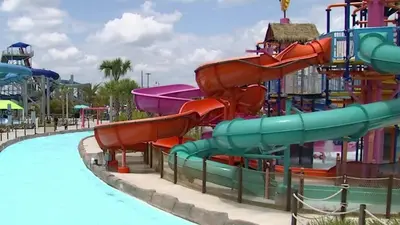 a water slide at a water park at Waterside Villa - Family 4 bed Emerald Island Resort pool home that's close to Disney World in Kissimmee