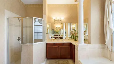 a bathroom with a shower and a sink at Closest to Disney in Orlando
