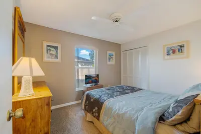 a bedroom with a bed and a window at Quiet Home With Private Pool- Near Disney in Kissimmee