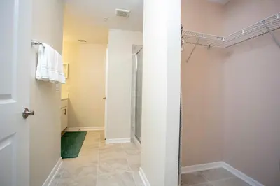 a bathroom with a shower and a walk in shower at Gorgeous Two Bedroom Apto Close to Disney 306 in Kissimmee