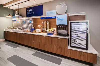 an apple store with a counter with an appleasteryasteryasteryasteryasteryasteryastery at Holiday Inn Express Hotel & Suites Orlando - Apopka by IHG in Orlando