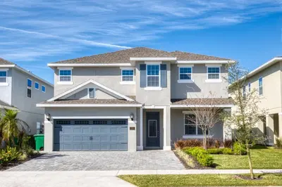 a large house with a garage at Cozy Home With Private Pool, Air Hockey Table And Themed Room Near Disney With Waterpark & Resort Access At Encore Resort - 7458Mr in Kissimmee