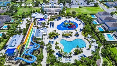 an aerial view of a water park at a resort at Chic Home With Mini Soccer Field, Golf Near Disney With Waterpark & Resort Access At Encore Resort - 7715Ff in Kissimmee