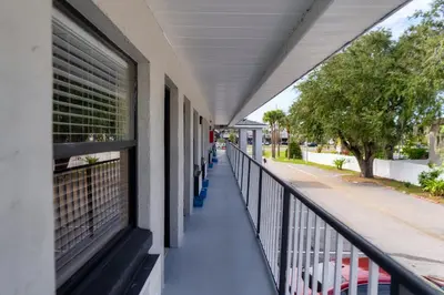 a balcony with a view of a street at Sunshine Inn in Kissimmee