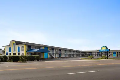 an empty street in front of a hotel at Days Inn by Wyndham Apopka/Orlando in Orlando