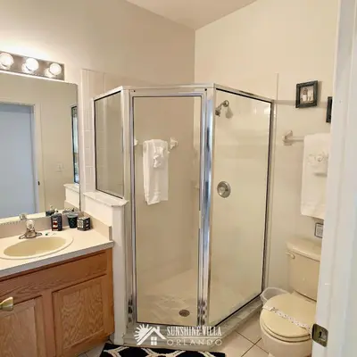 a bathroom with a shower and a sink at Affordable Luxury Home Near Walt Disney World - Sunshine Villa at Glenbrook Resort, Orlando, Florida in Orlando