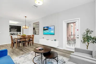 a living room with a couch and a table at Ground-Floor Vista Cay Condo Near Clubhouse Pool in Orlando