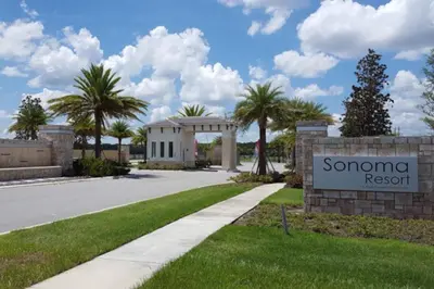 a sign for someone resort in front of a building at 3830 Premier Villa 6Bd Private Pool and Game Room in Kissimmee